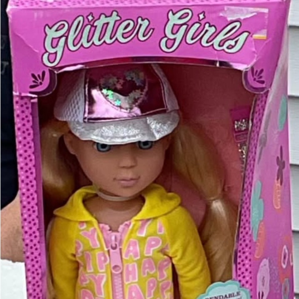 Doll with Yellow Outfit and Pink Accessories